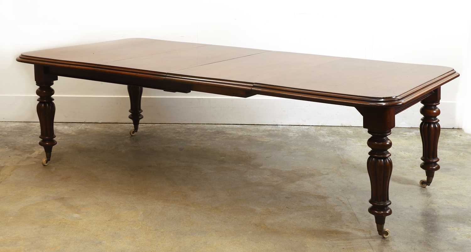 Lot 530 - A mahogany extending dining table