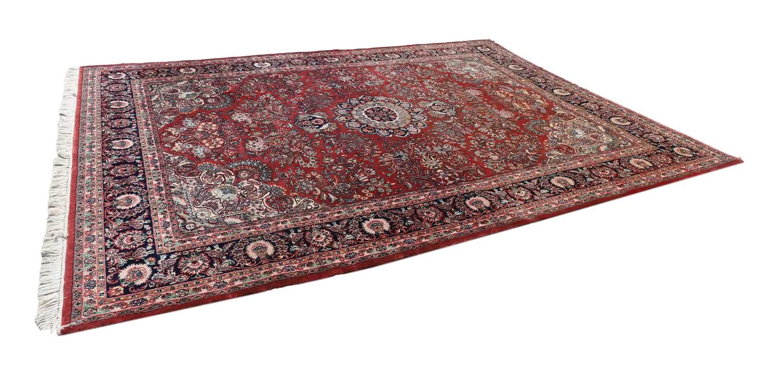 Lot 437 - A large contemporary wool Persian rug