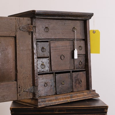 Lot 321 - A small oak cabinet of drawers