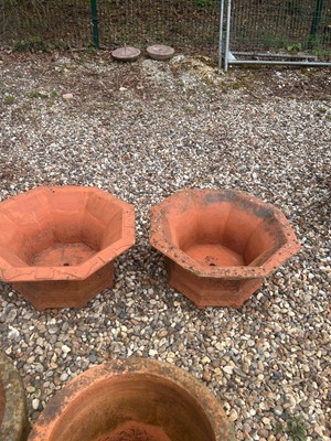 Lot 560 - A pair of terracotta planters