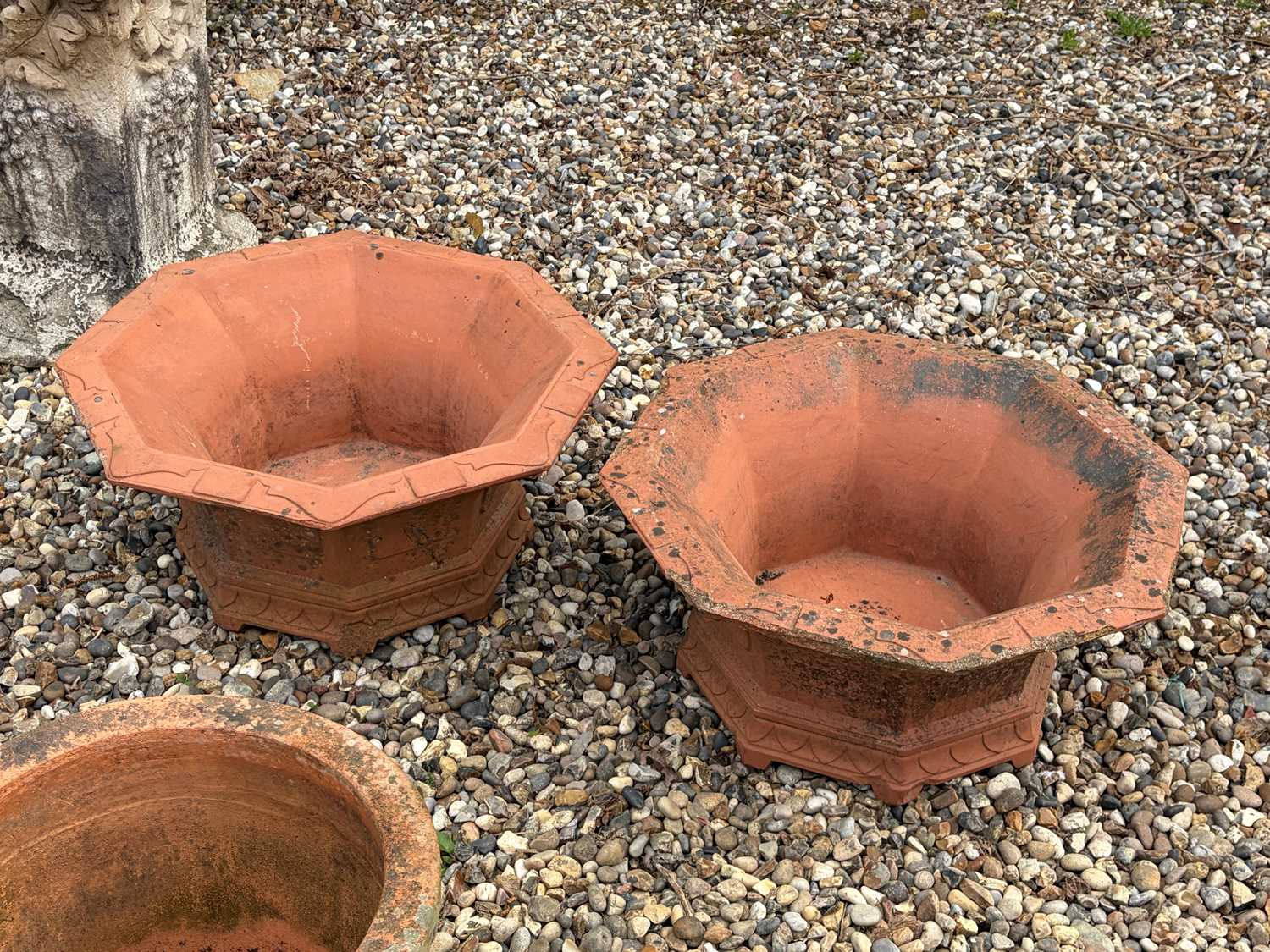 Lot 560 - A pair of terracotta planters