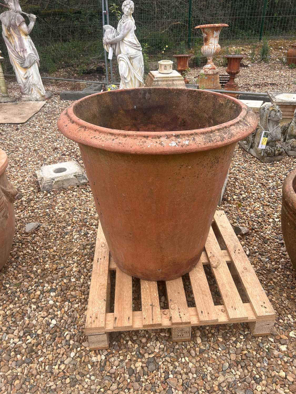 Lot 568 - A large terracotta planter