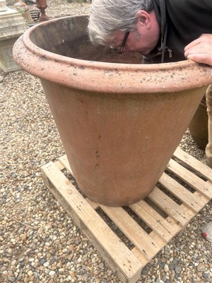 Lot 568 - A large terracotta planter