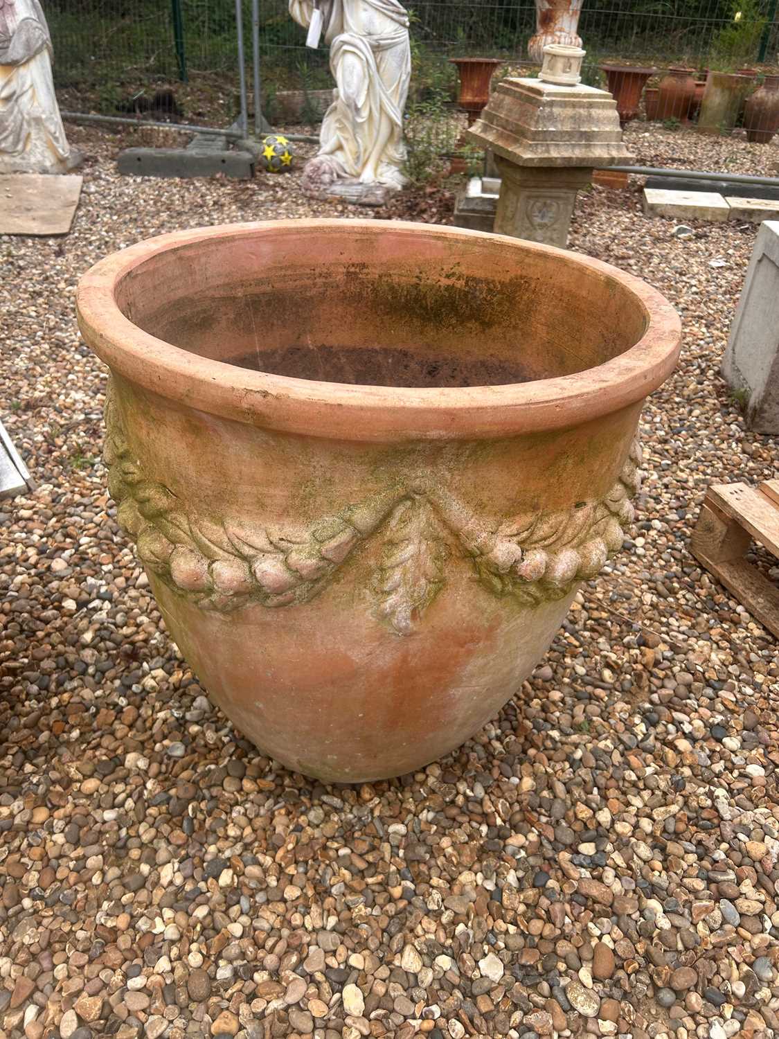Lot 569 - A large terracotta planter