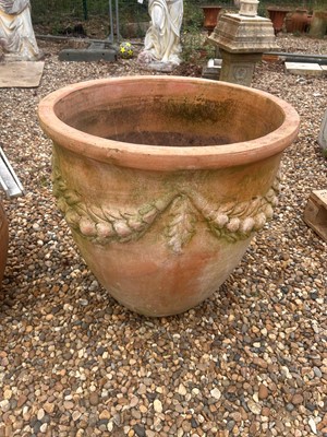 Lot 569 - A large terracotta planter