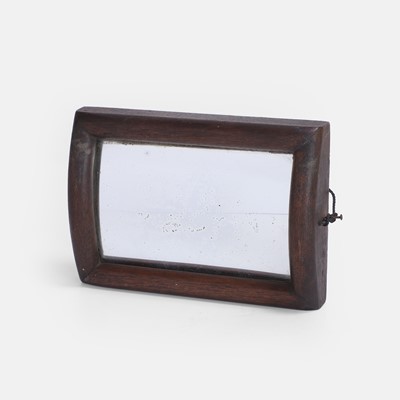Lot 58 - A curved illusion mirror