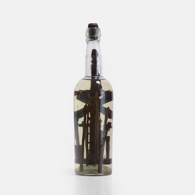 Lot 128 - A bottle of holy water containing the tools of Christ