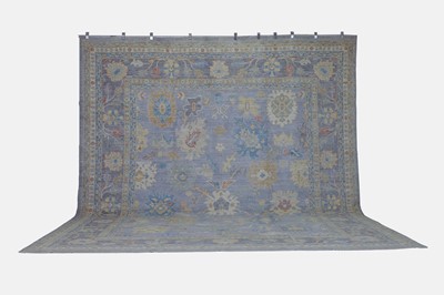 Lot 319 - An Oushak wool carpet
