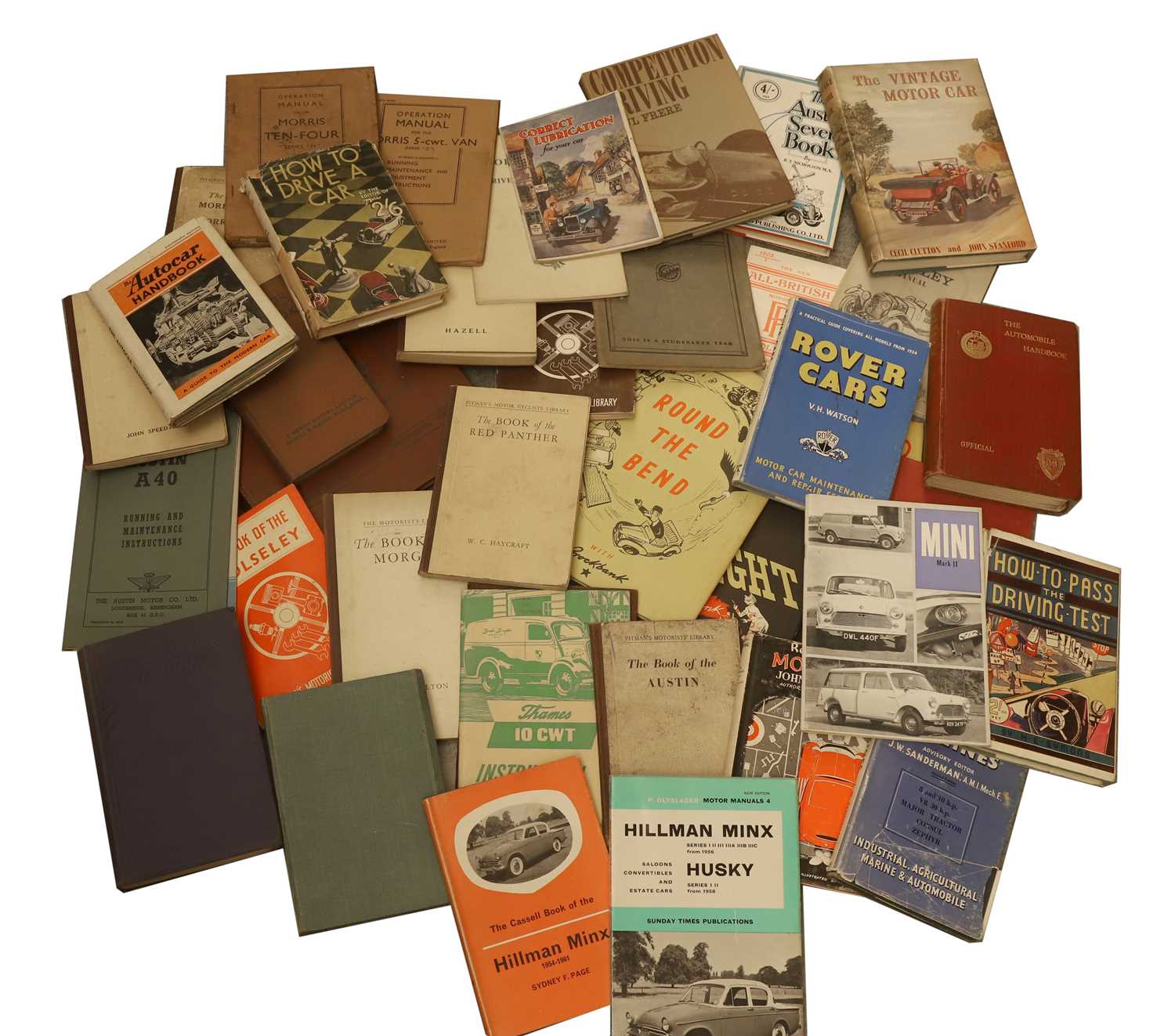 Lot 37 - A collection of early motoring manuals and guides