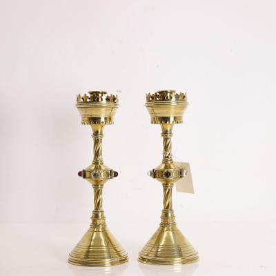 Lot 343 - A pair of Ecclesiastical brass candlesticks