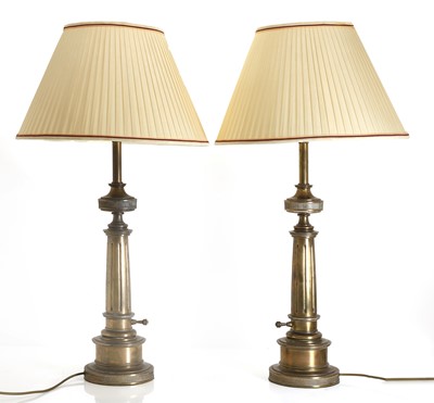Lot 475 - A pair of brass table lamps