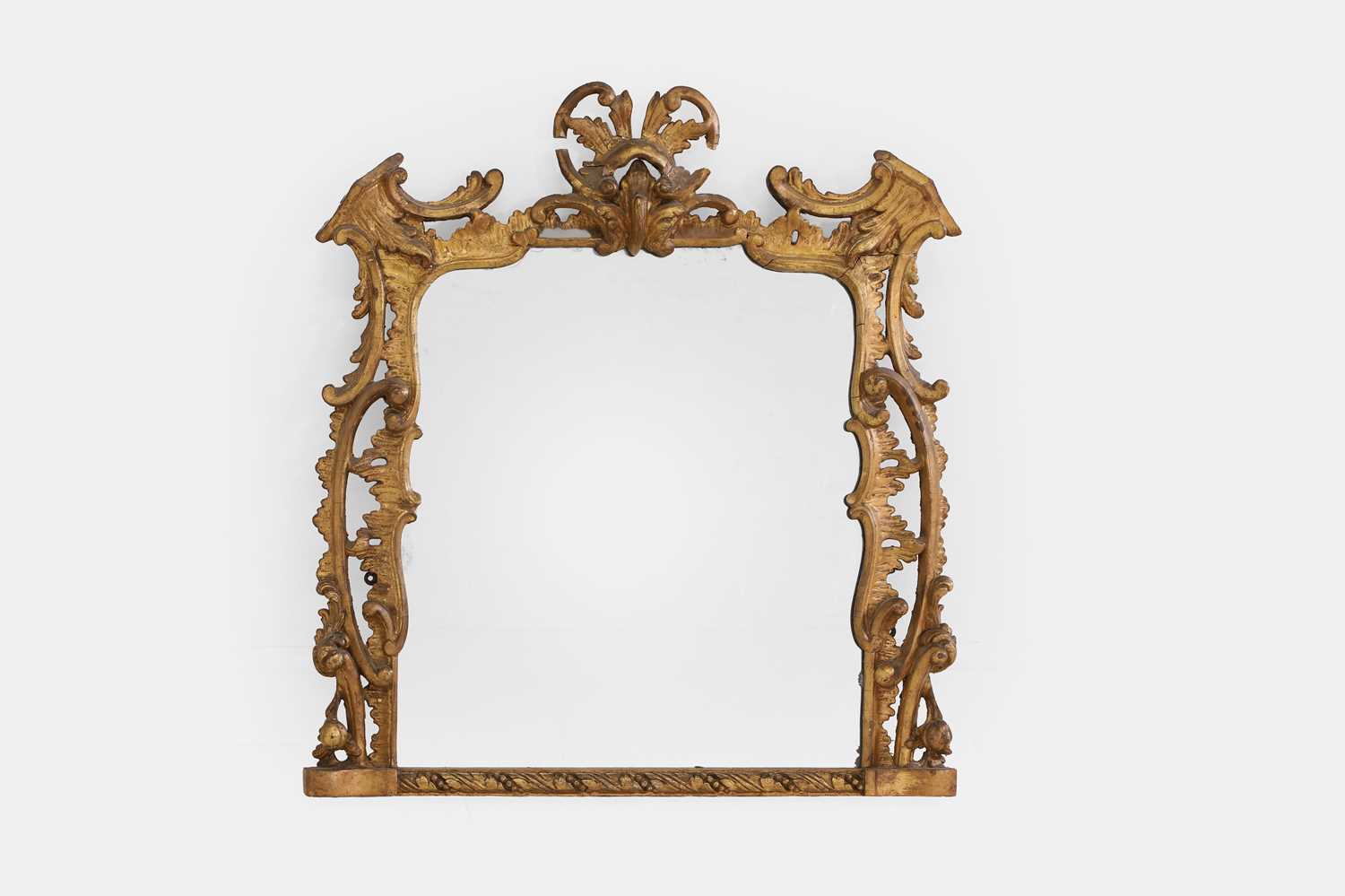 Lot 432 - A giltwood rococo wall mirror