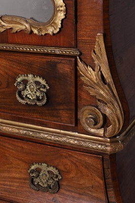 Lot A rococo kingwood and parcel-gilt bureau cabinet in the manner of Matthias Ortmann