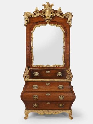 Lot A rococo kingwood and parcel-gilt bureau cabinet in the manner of Matthias Ortmann