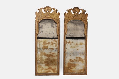 Lot 517 - A pair of large Queen Anne-style giltwood and gesso pier mirrors
