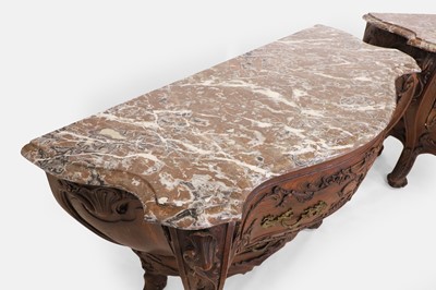 Lot 50 - A pair of rococo oak and marble bombé commodes