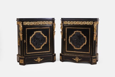 Lot 627 - A pair of Napoleon III ebonised and ormolu-mounted pier cabinets