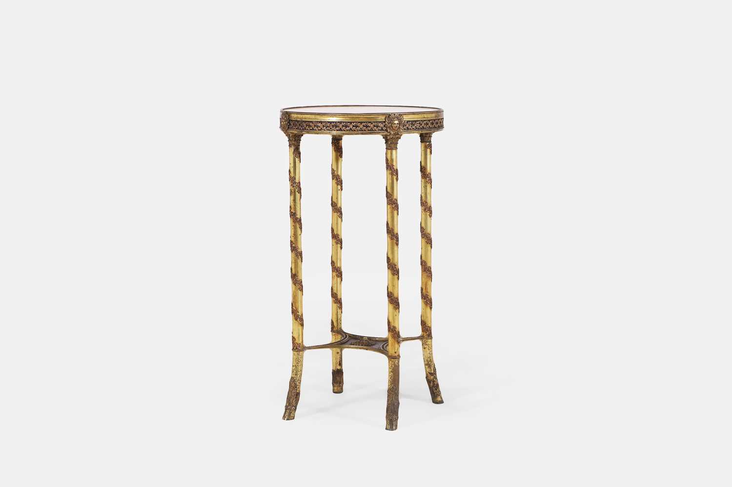 Lot 44 - A Louis XVI-style gilt-brass occasional table