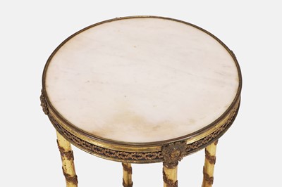 Lot 44 - A Louis XVI-style gilt-brass occasional table