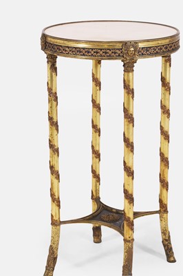Lot 44 - A Louis XVI-style gilt-brass occasional table