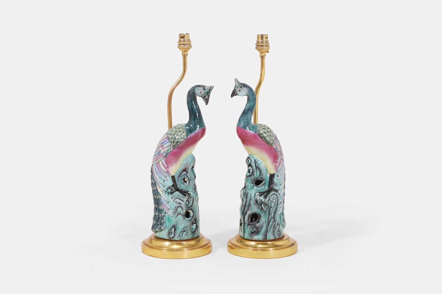 Lot 39 - A pair of export famille rose porcelain 'peacock' lamps