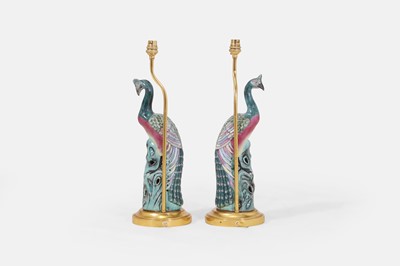 Lot 39 - A pair of export famille rose porcelain 'peacock' lamps