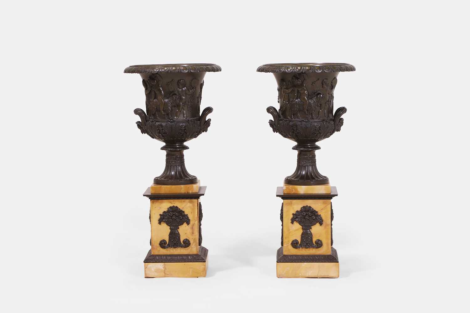 Lot 483 - A pair of grand tour patinated bronze 'Medici' vases