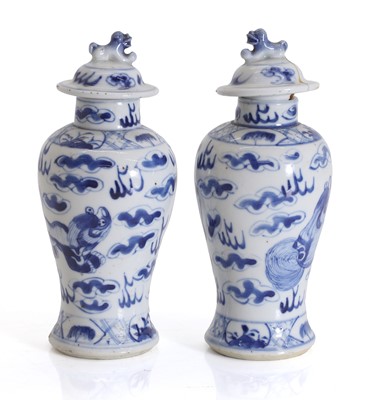 Lot 55 - A pair of Chinese blue and white vases and covers