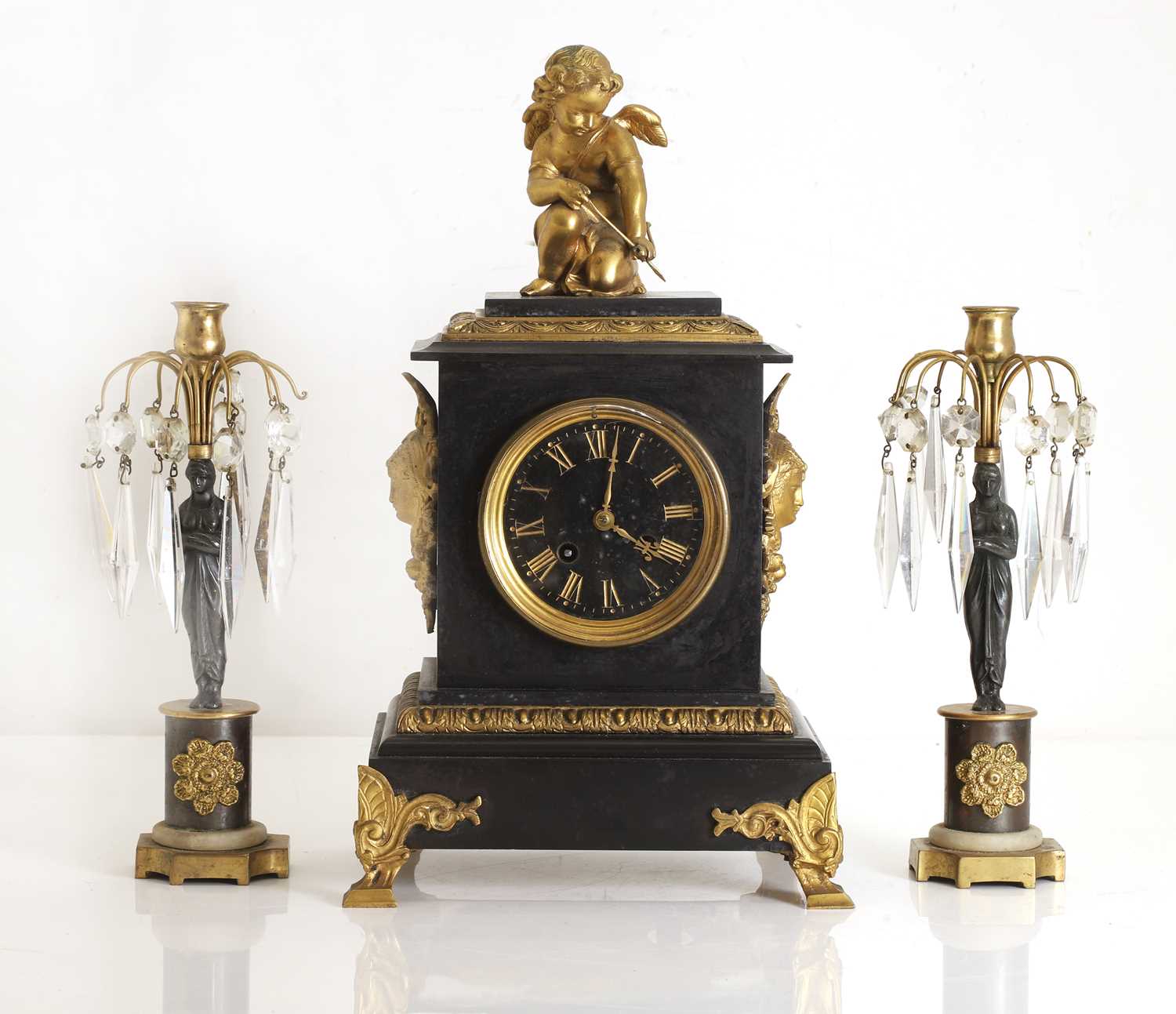 Lot 203 - A black marble and gilt metal mantel clock