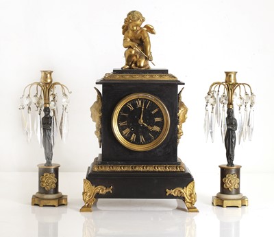 Lot 203 - A black marble and gilt metal mantel clock