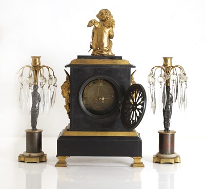 Lot 203 - A black marble and gilt metal mantel clock
