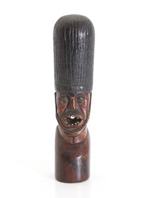 Lot 325 - A trench art figural carving