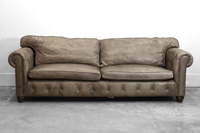 Lot 505 - A large grey leather upholstered chesterfield sofa