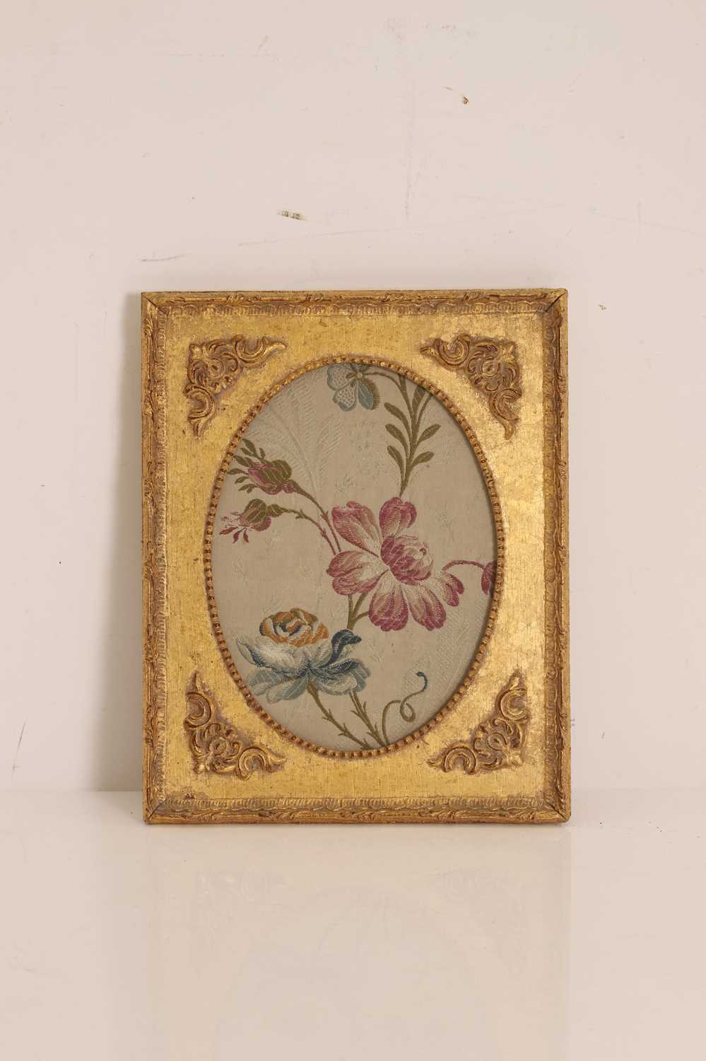 Lot 301 - A floral woven silk panel