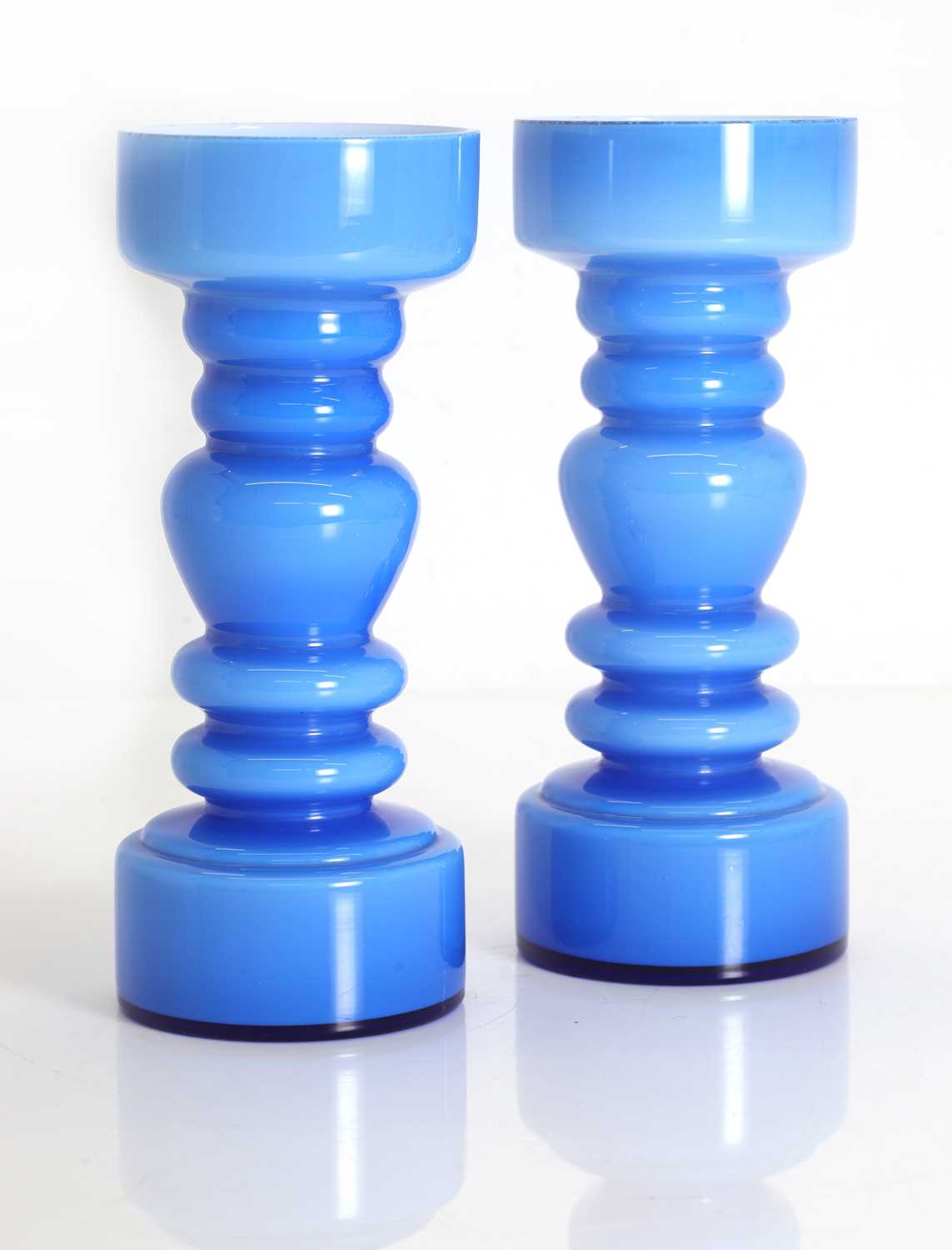 Lot 155 - A pair of blue glass vases