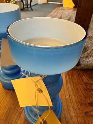 Lot 155 - A pair of blue glass vases