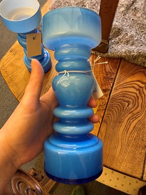 Lot 155 - A pair of blue glass vases