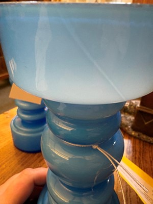 Lot 155 - A pair of blue glass vases