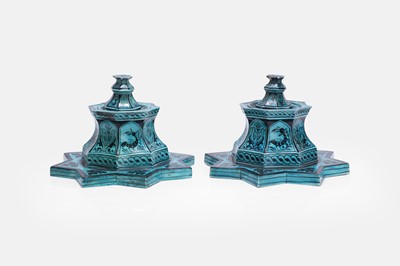 Lot 372 - A pair of Iznik-style glazed earthenware inkwells and covers