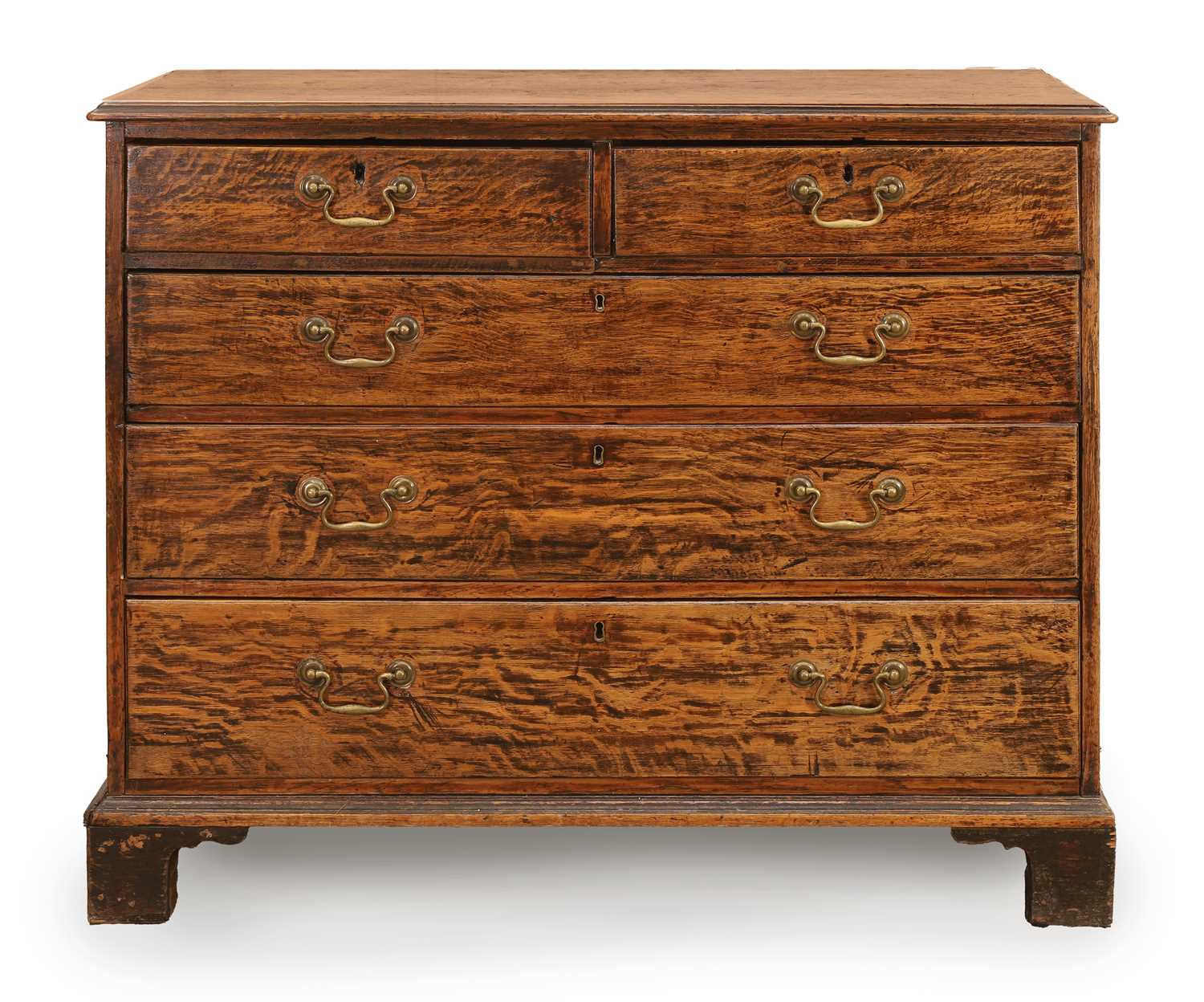 Lot 504 - A George III 'tiger' oak chest of drawers