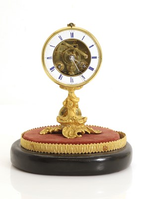 Lot 202 - A French gilt table clock
