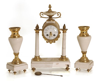 Lot 205 - A gilt and marble clock garniture