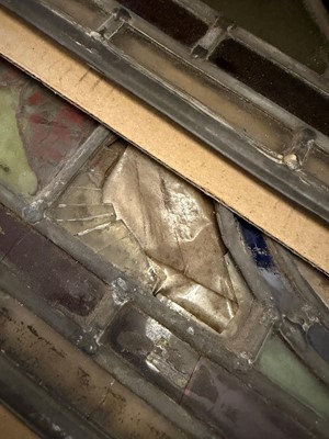 Lot 157 - A pair of Arts and Crafts stained glass panels