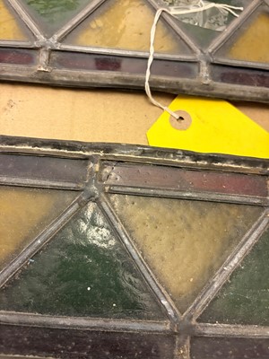 Lot 157 - A pair of Arts and Crafts stained glass panels