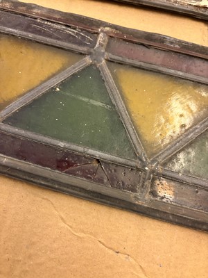 Lot 157 - A pair of Arts and Crafts stained glass panels