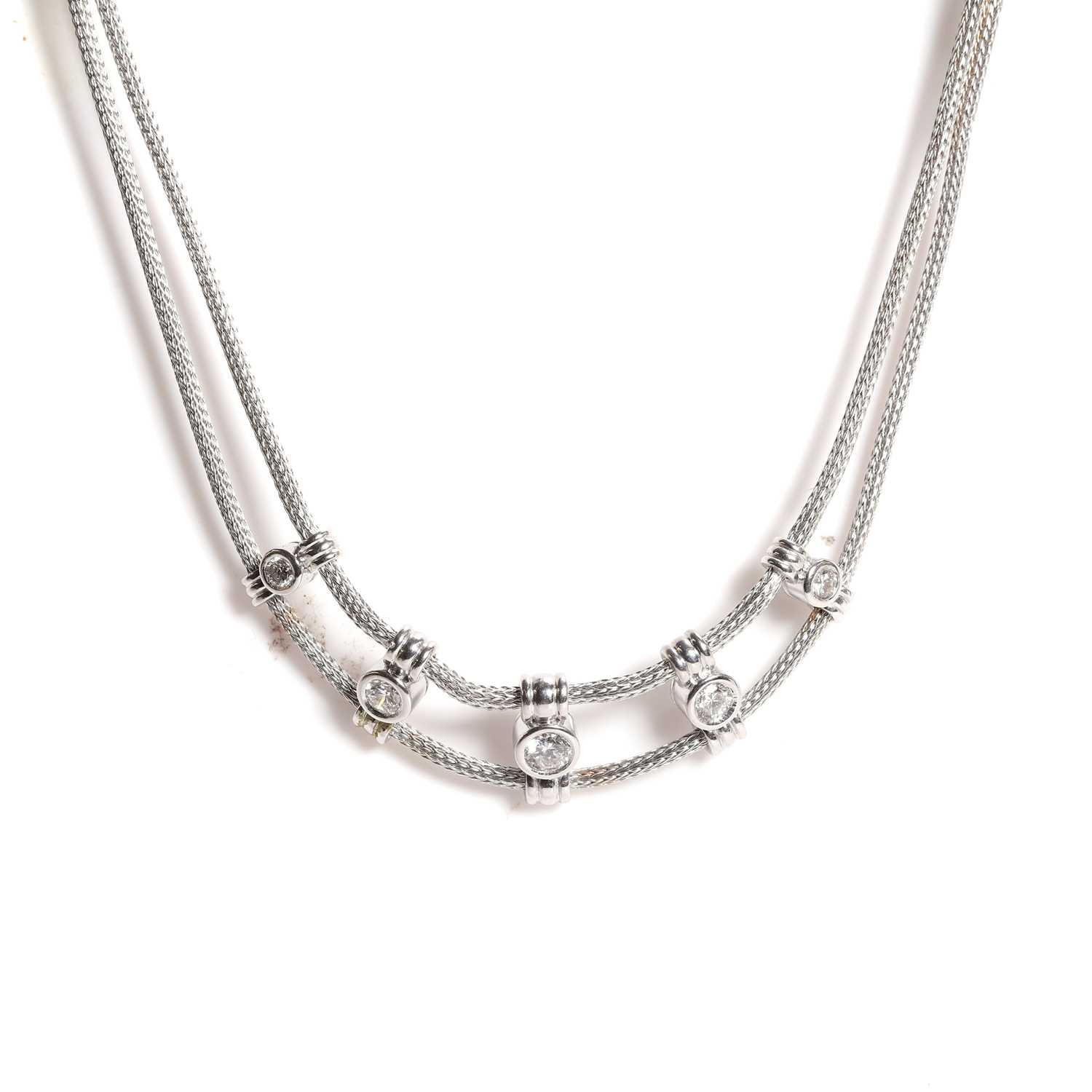 Lot 179 - A double row diamond set choker