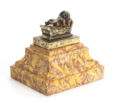 Lot 3 - A marble and silver desk weight