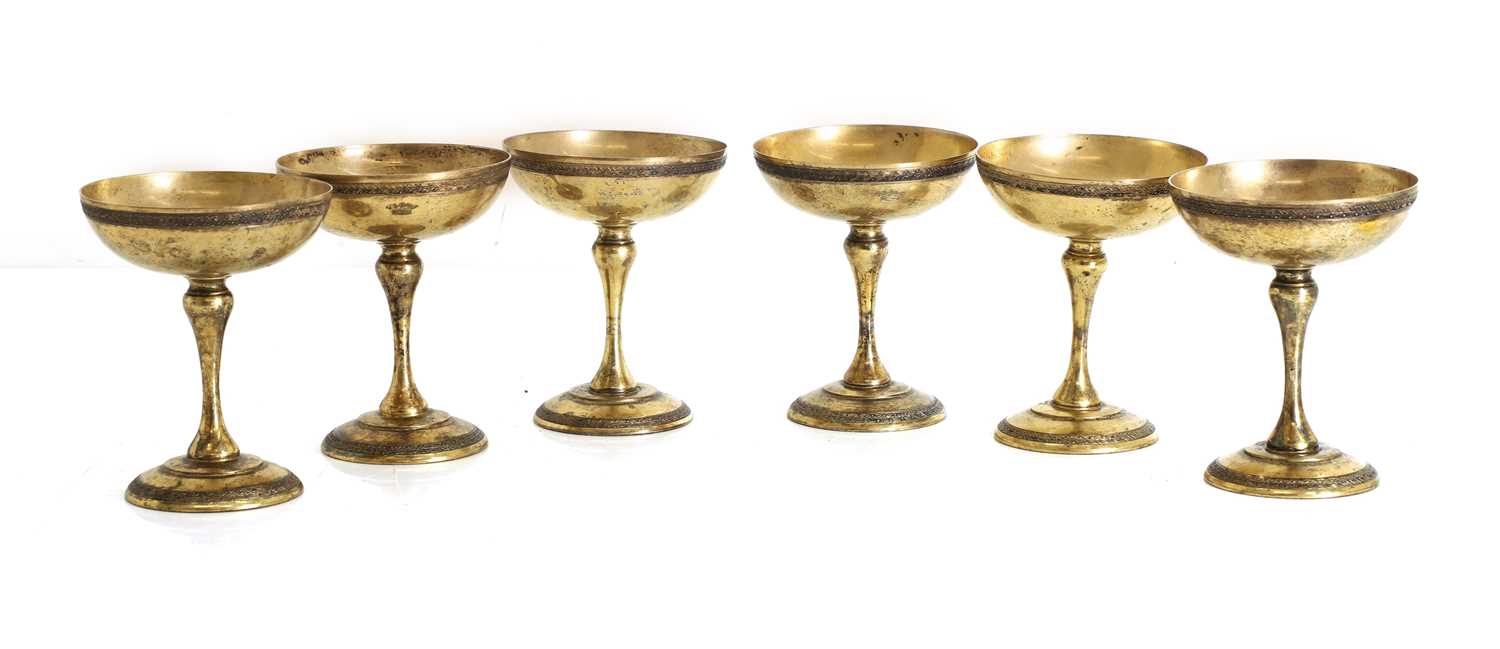 Lot 4 - A set of six silver coupe glasses