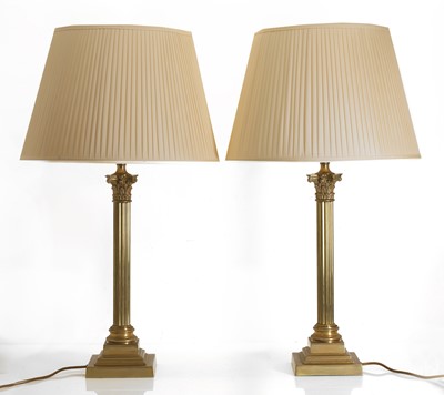 Lot 477 - A pair of brass Corinthian columns table lamps