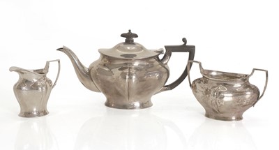 Lot 42 - A silver three piece tea set